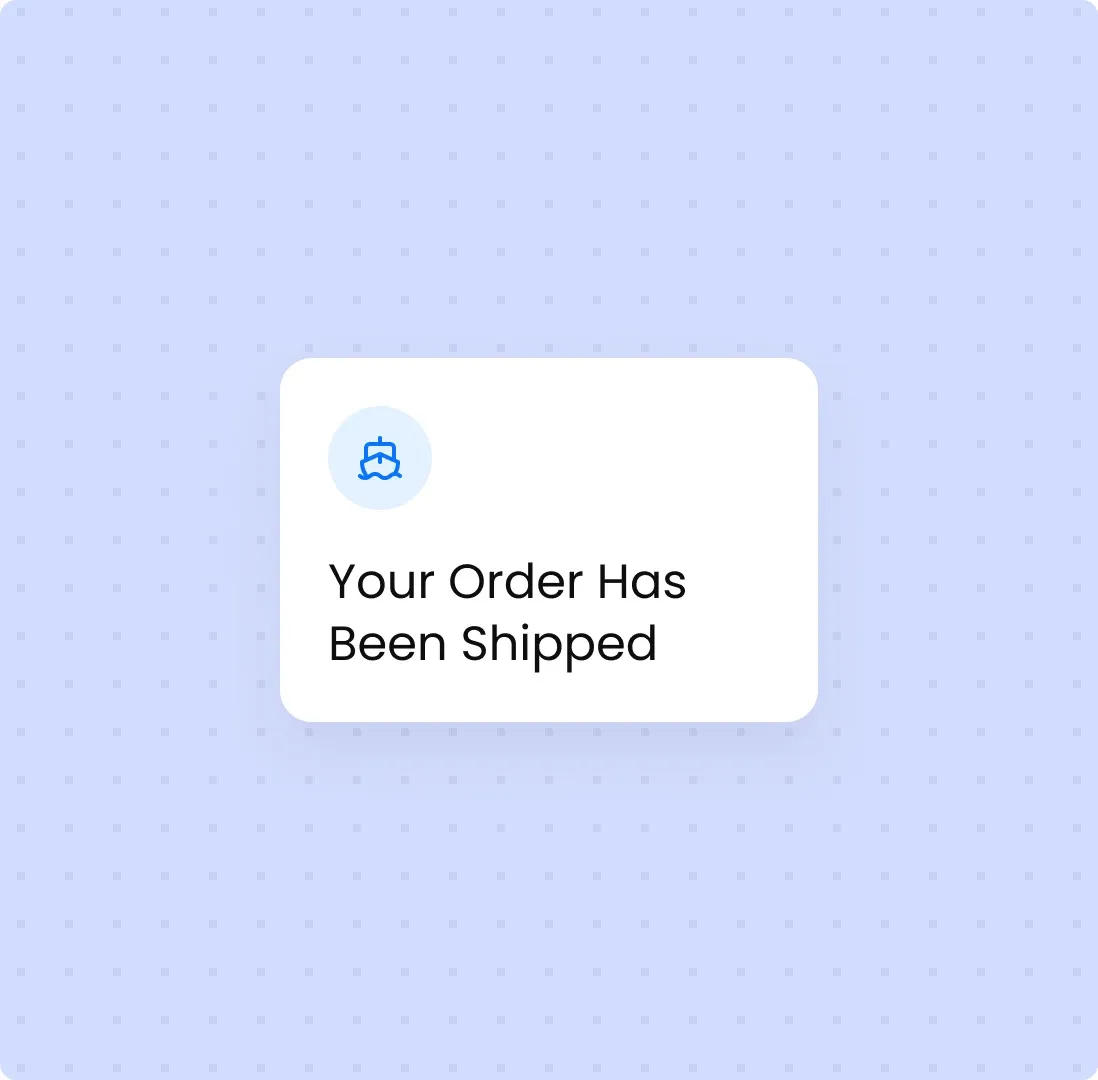 A shipping notification card reading “Your Order Has Been Shipped”